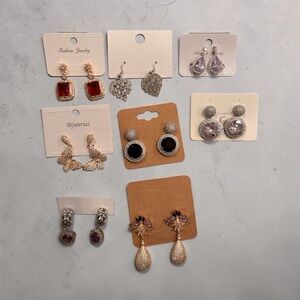 Set of 8 Elegant Gold and silver tone Earrings. Resell or keep for yourself.